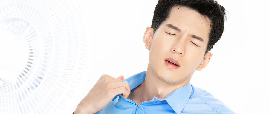 摄图网_501376462_wx_夏日男性出汗吹风扇（企业商用）.jpg